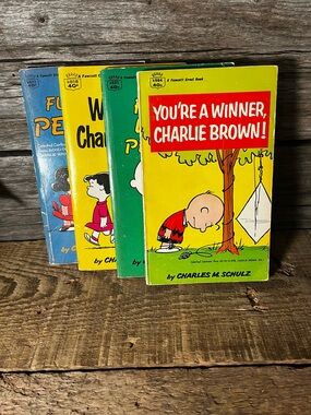 (4) 1960s CHARLIE BROWN Fawcett Paperbacks - Excellent vintage condition